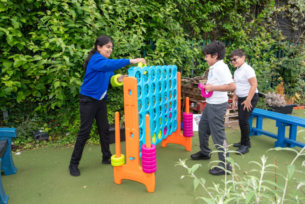 a picture of students playing connect four