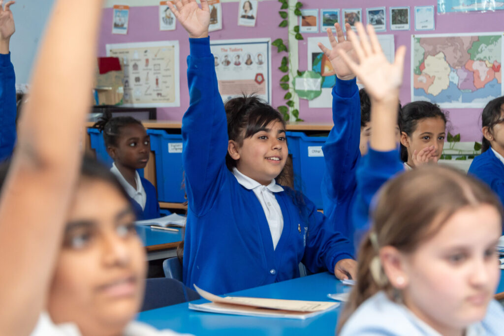 a picture with the student's hands up